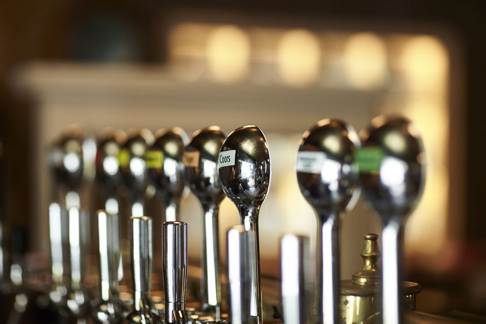 Bar taps display, shiny metal bar taps